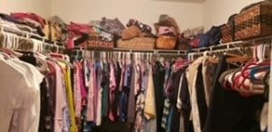 Closet before – overfilled hanging rods