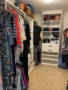 Closet before – cluttered walk-in